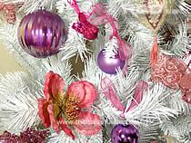 detail of a Xmas tree decorated with pink ornaments