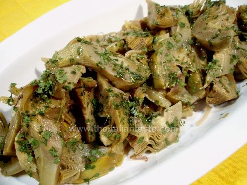 Artichokes cooked in olive oil with garlic and parsley
