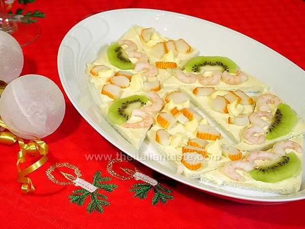 Fish and fruit on canapés