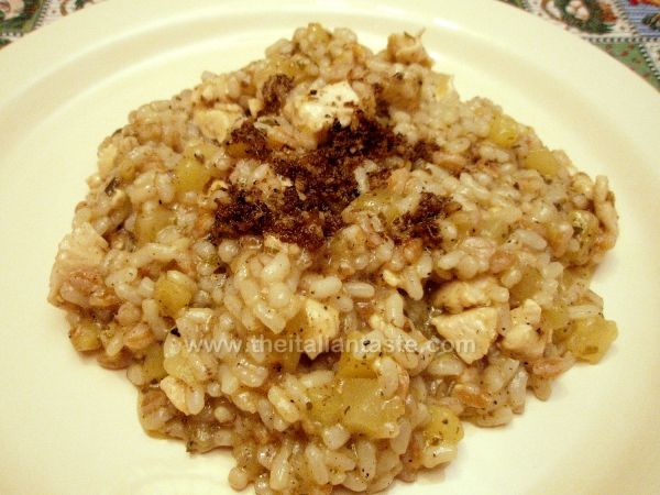 Risotto with potatoes, chicken and black truffles