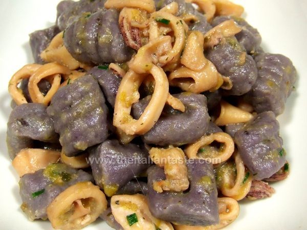 Blue-violet gnocchi with squid sauce